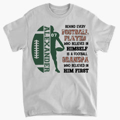 Behind Every Football Player Who Believes In Himself - Personalized T-Shirt, Gift For Football Family/ Football Fan - TS265AN