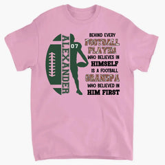 Behind Every Football Player Who Believes In Himself - Personalized T-Shirt, Gift For Football Family/ Football Fan - TS265AN